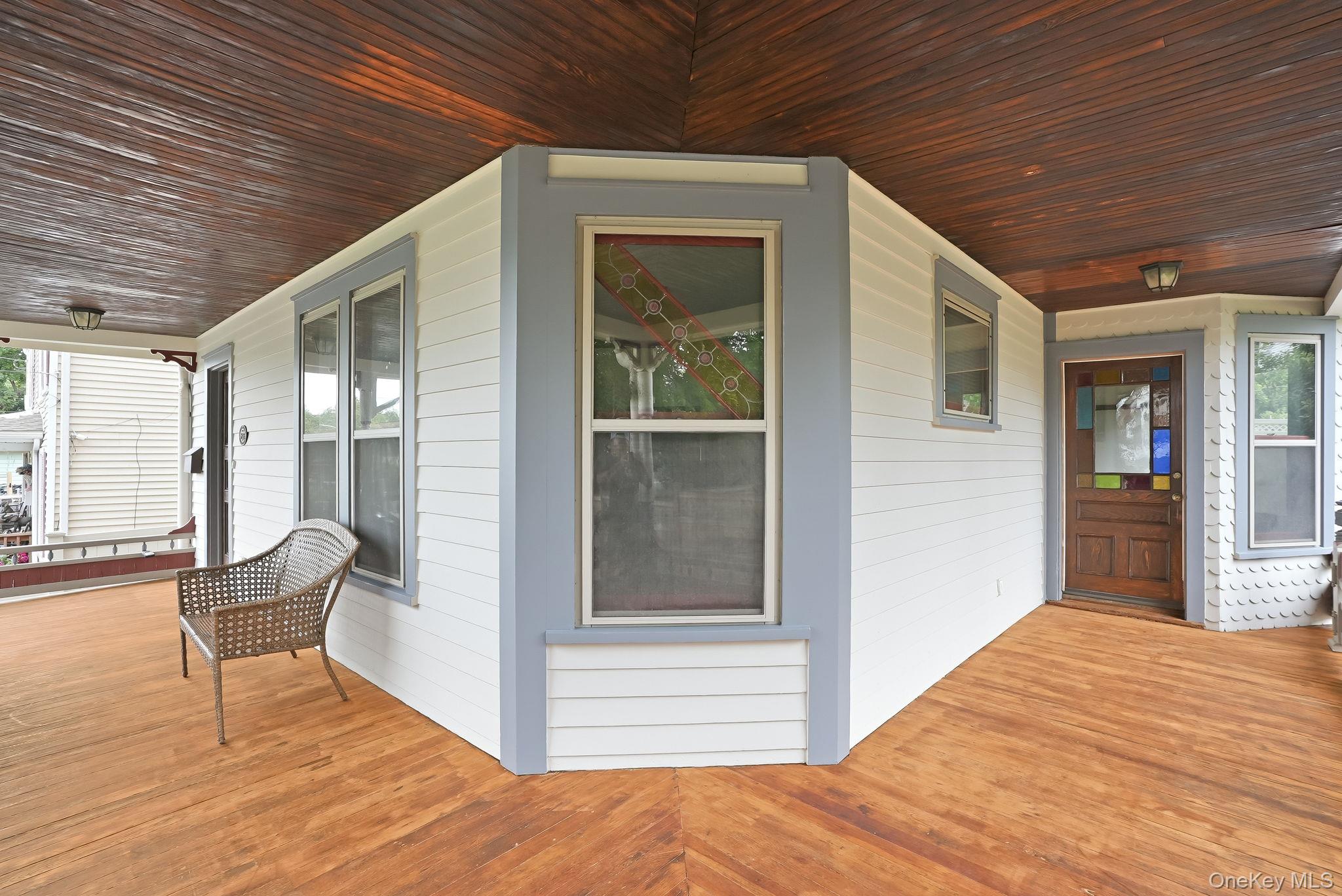 834 John Street Peekskill, NY 10566 - Photo 4 of 37 Wrap around porch, door on right goes to dining room.Stunning original stained glass.