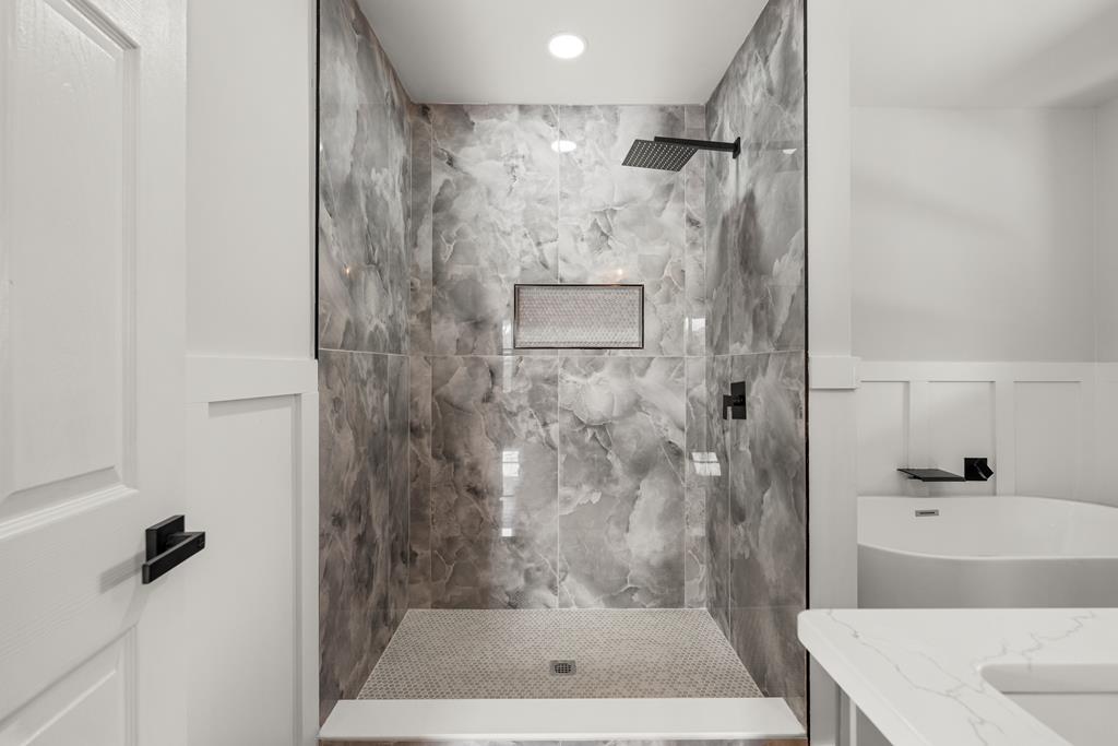 2312 Burnside Drive Columbus, GA 31907 - Photo 18 of 25 a bathroom with a shower and a sink