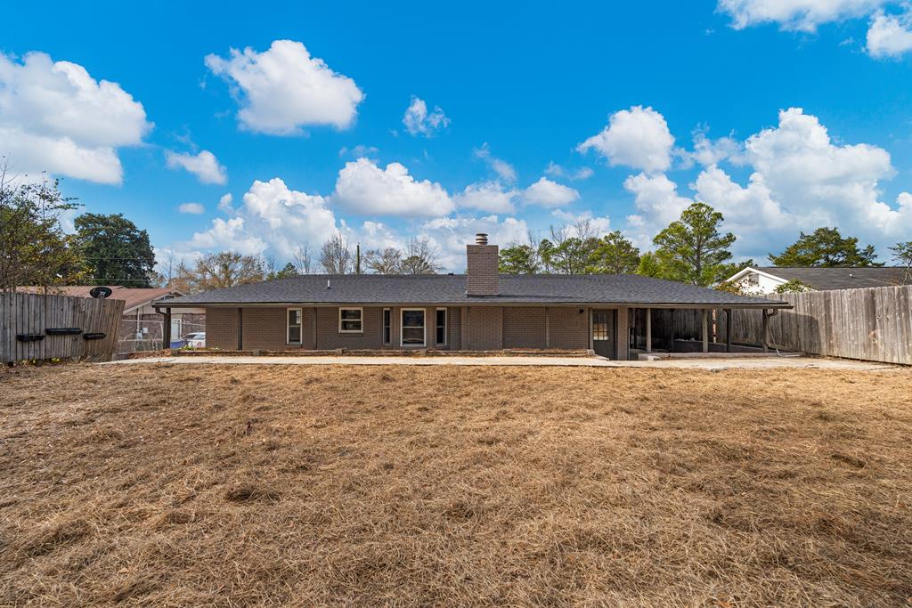 2312 Burnside Drive Columbus, GA 31907 - Photo 25 of 25 a view of a house with a backyard