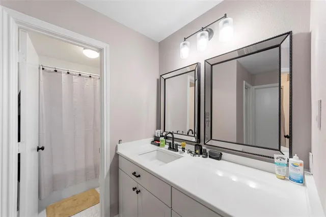 a bathroom with a toilet and a bathtub