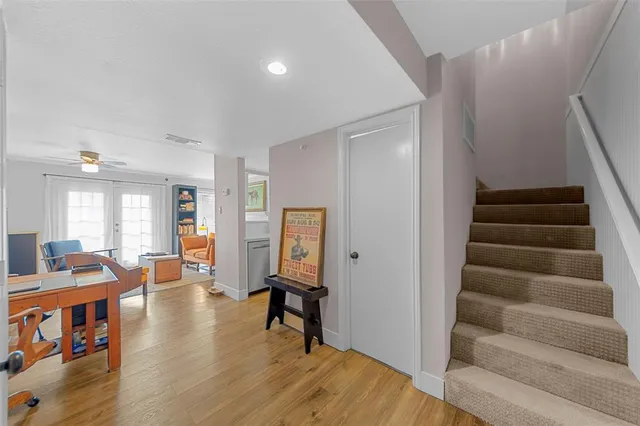 a workspace with furniture and a flat screen tv