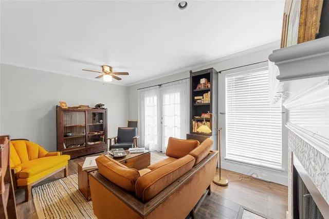a view of a dining area with furniture and wooden floor