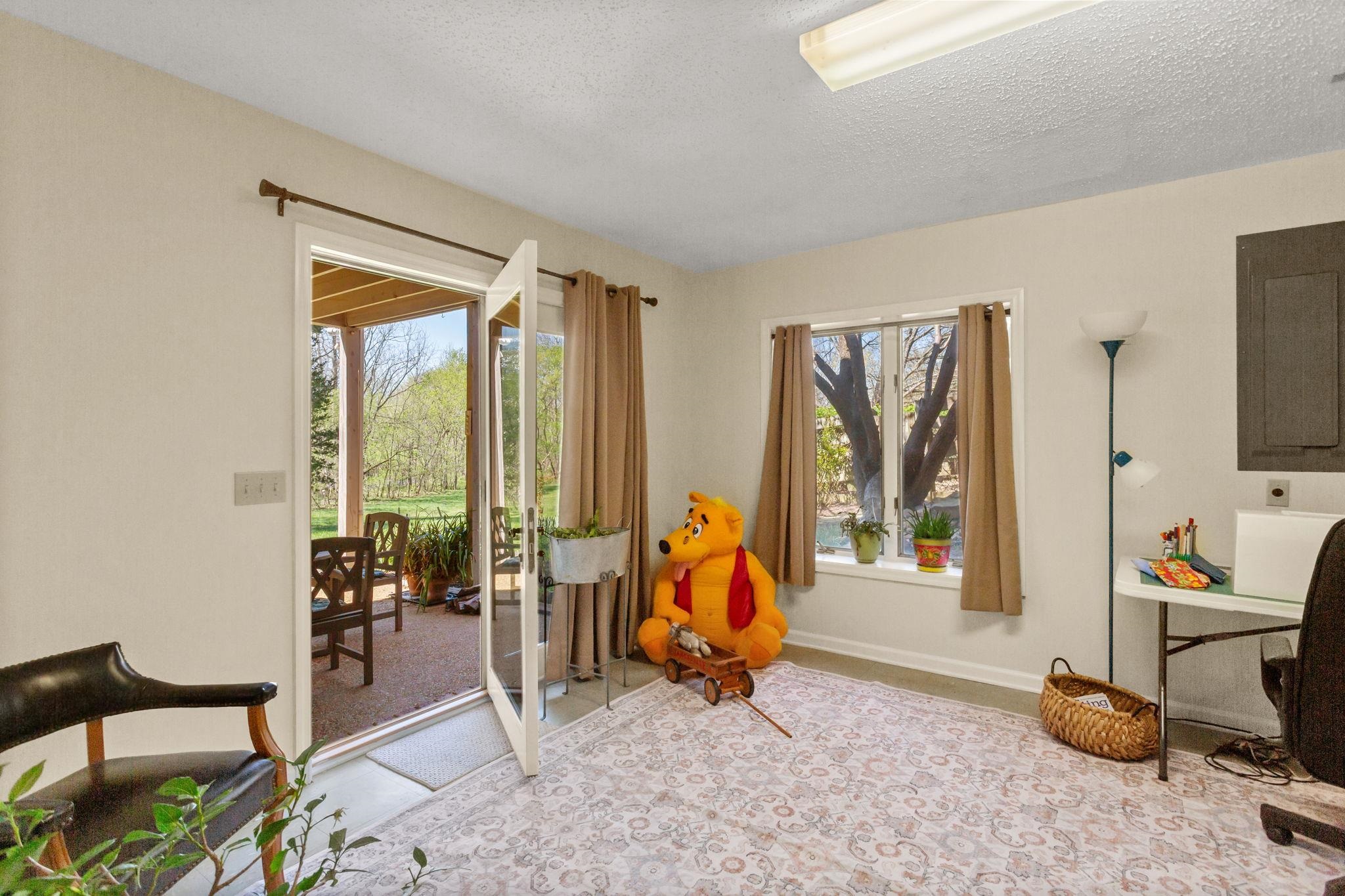 13004 Indian Trail Road Broadway, VA 22815 - Photo 37 of 56 to covered terrace off the family room with access to the pool and terrace.
