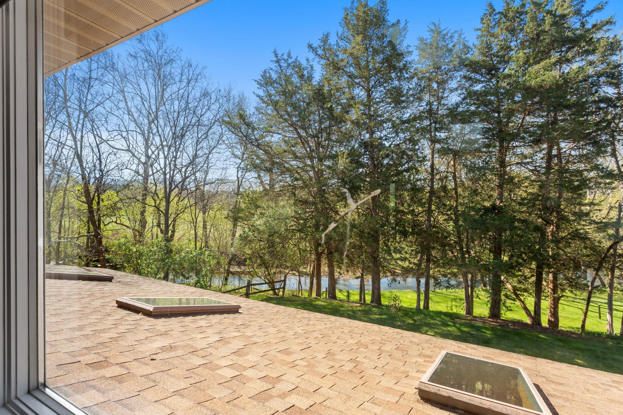 13004 Indian Trail Road Broadway, VA 22815 - Photo 10 of 56 out over the pool room to Smith Creek.