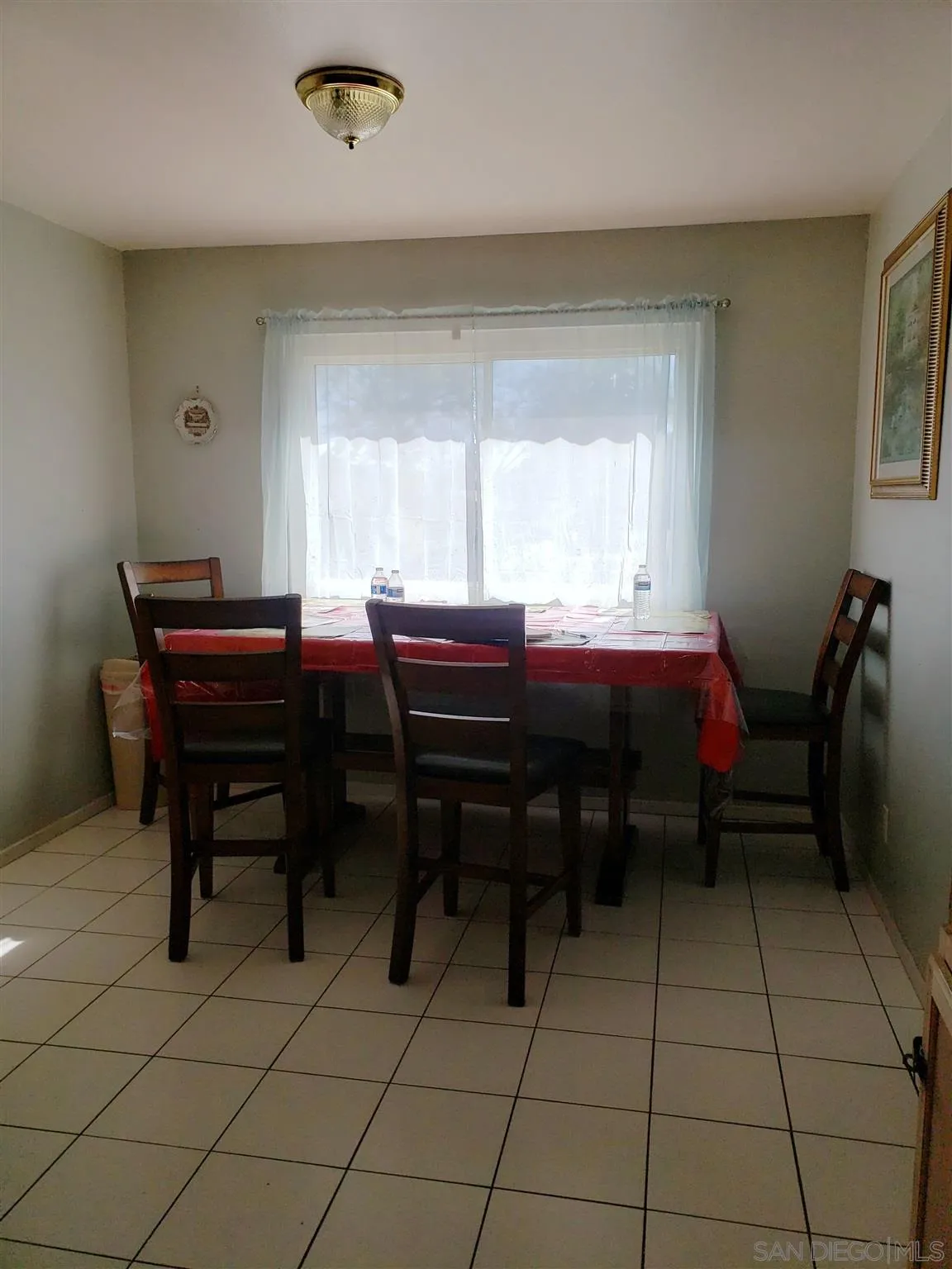 1704 Rees Road San Marcos, CA 92069 - Photo 4 of 6 a dining room with a table and chairs