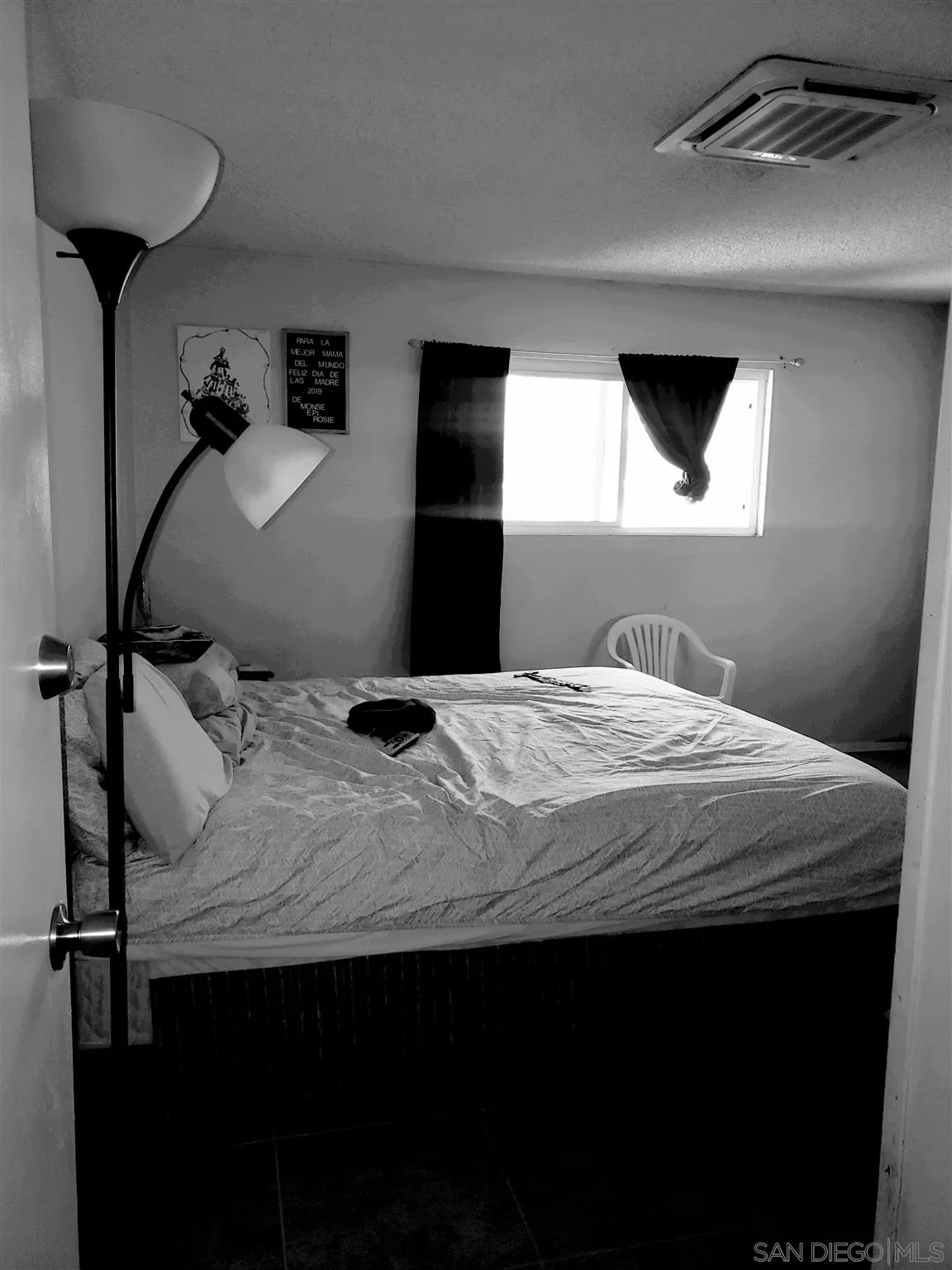 1704 Rees Road San Marcos, CA 92069 - Photo 5 of 6 a bedroom with a bed and a window