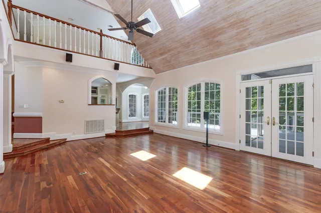 a living room with furniture and a table