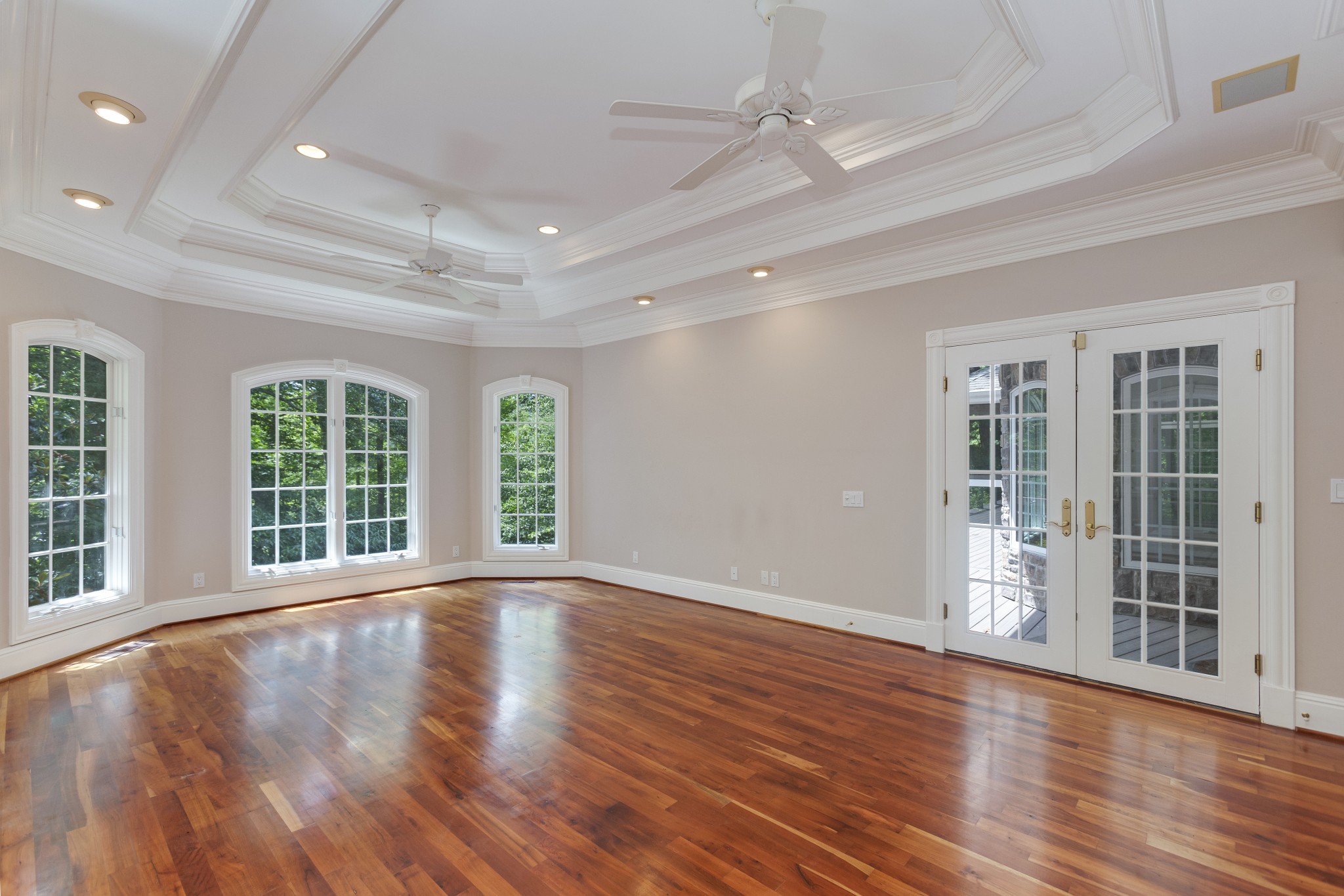 415 Cooksey Batson Road Charlotte, TN 37036 - Photo 21 of 60 a view of an empty room with wooden floor and a window