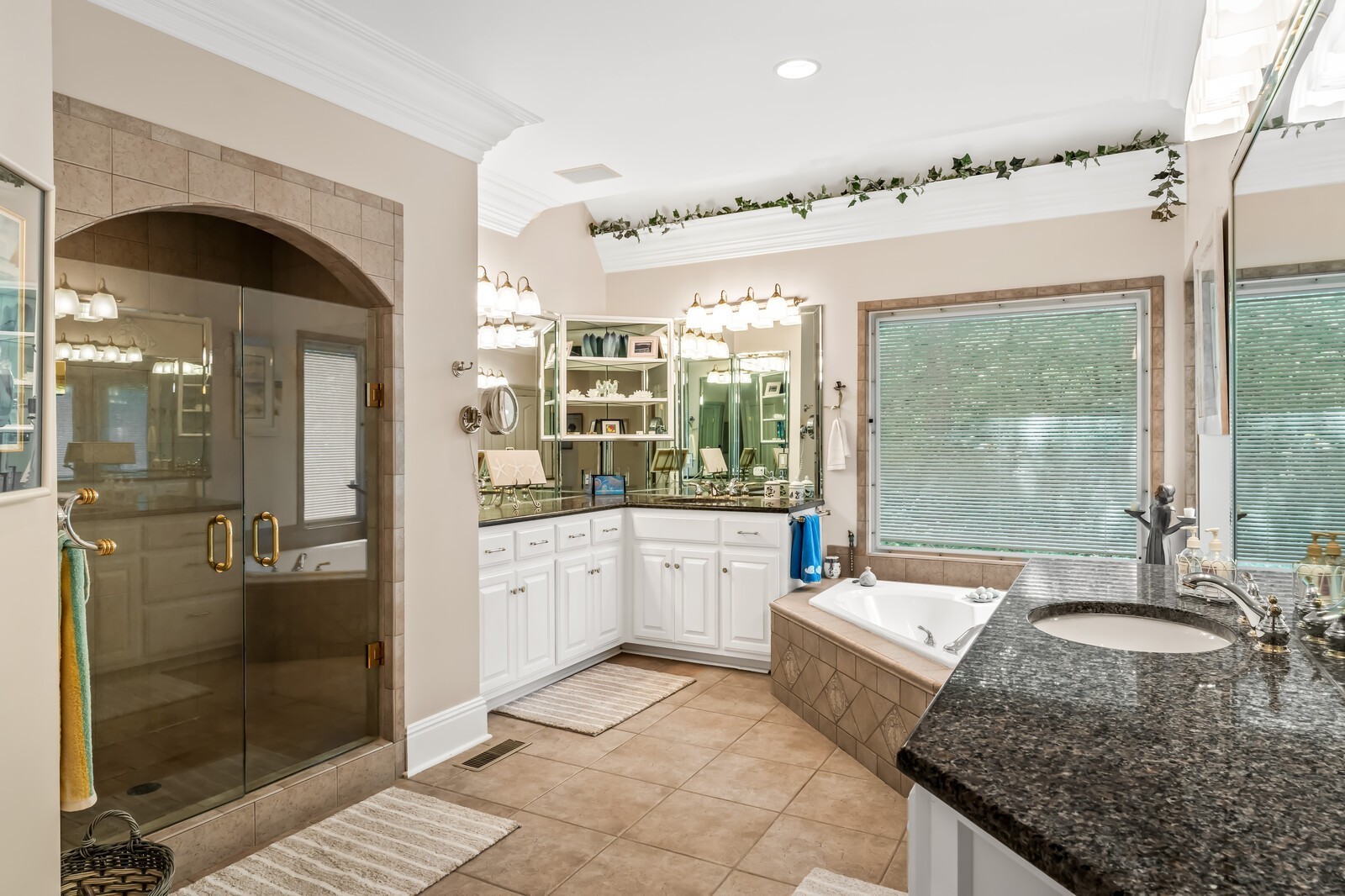 415 Cooksey Batson Road Charlotte, TN 37036 - Photo 29 of 60 a spacious bathroom with a granite countertop sink mirror and shower