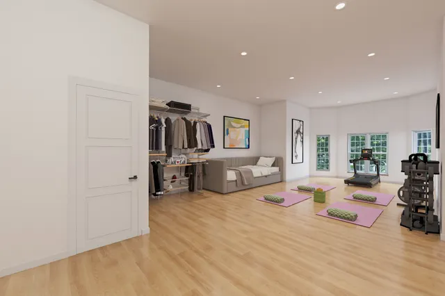 a bathroom with a granite countertop sink a light fixture and a mirror