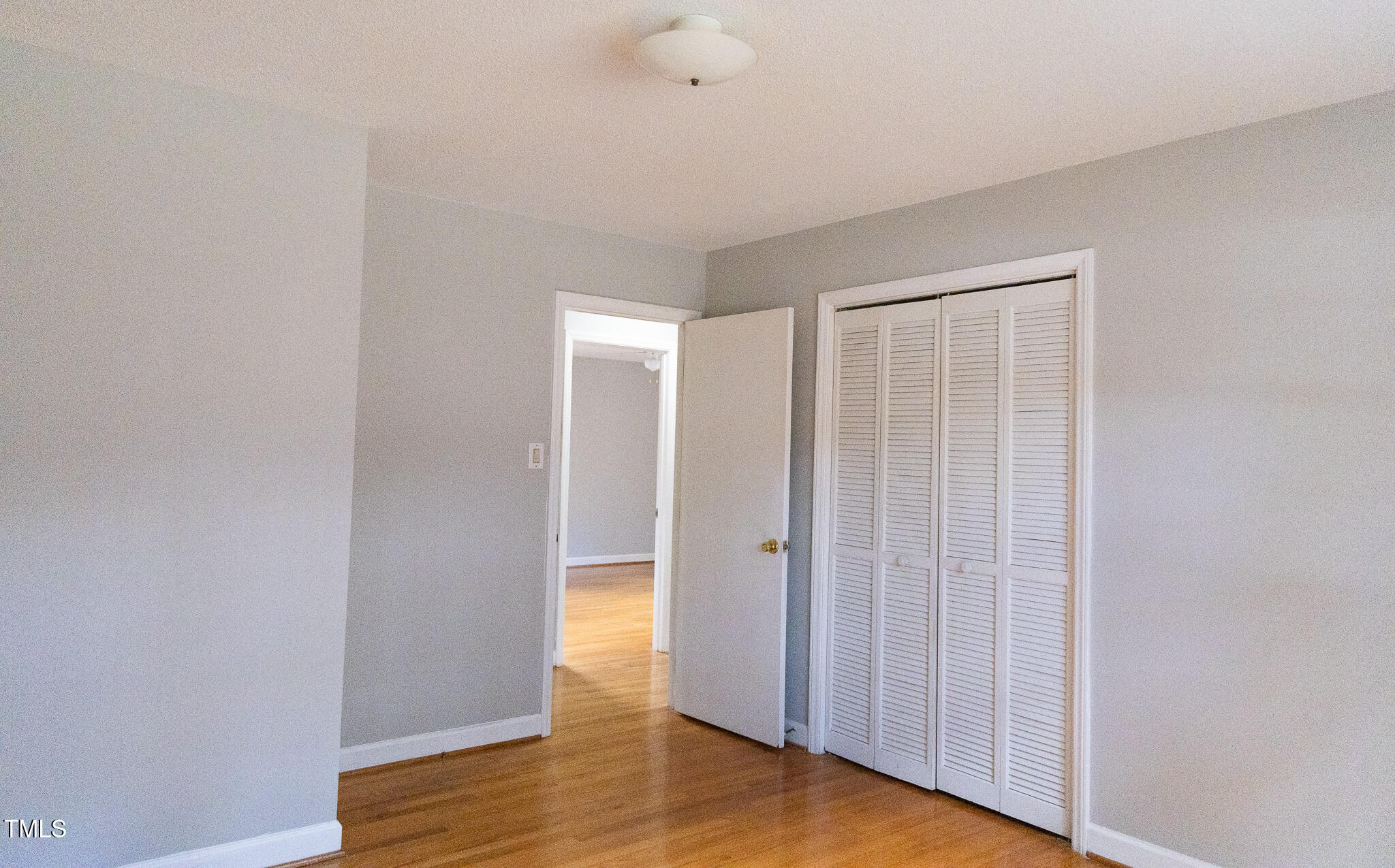 3212 Sparger Road Durham, NC 27705 - Photo 27 of 57 a view of a room with wooden floor