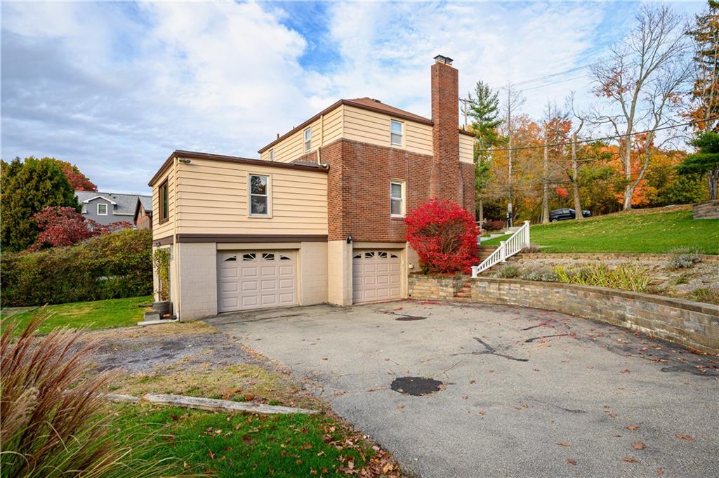 501 Sangree Road Pittsburgh, PA 15237 - Photo 27 of 29 a front view of a house with a yard