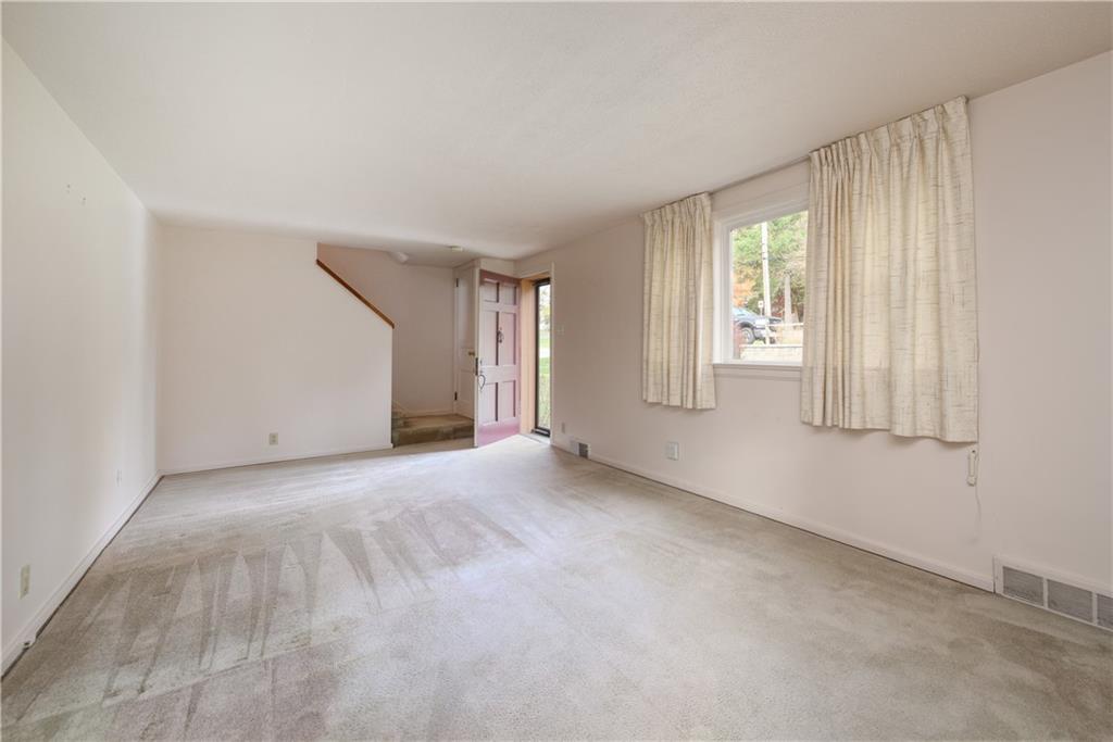 501 Sangree Road Pittsburgh, PA 15237 - Photo 3 of 29 a view of an empty room with a window