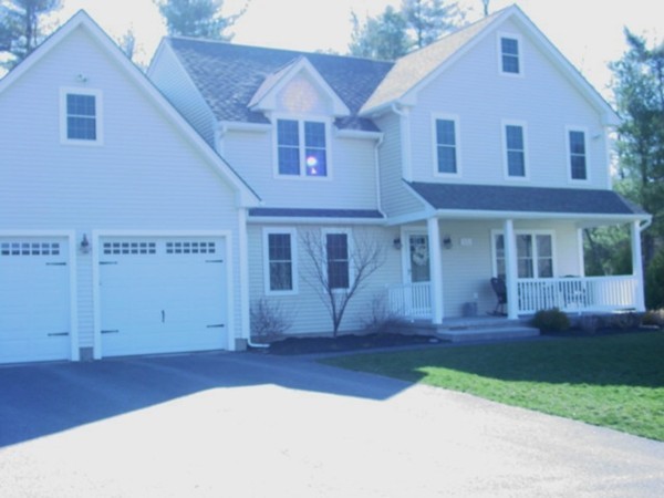 14 Carlson's Way Rutland, MA 01543 - Photo 1 of 20 a front view of a house with a yard