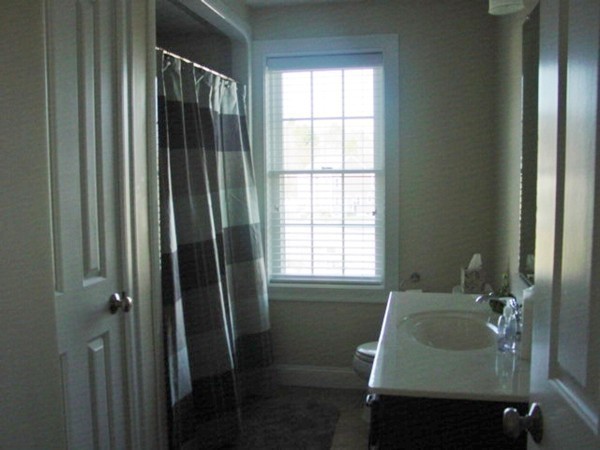 14 Carlson's Way Rutland, MA 01543 - Photo 18 of 20 a bathroom with a sink and tub