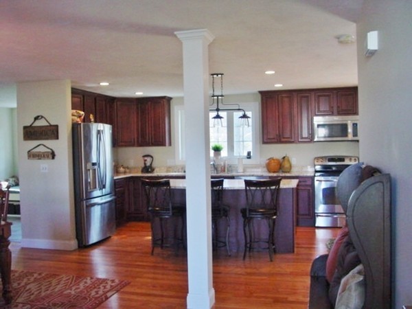 14 Carlson's Way Rutland, MA 01543 - Photo 4 of 20 a kitchen with stainless steel appliances granite countertop a refrigerator stove microwave and cabinets