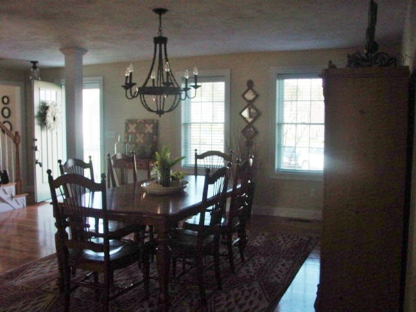 14 Carlson's Way Rutland, MA 01543 - Photo 7 of 20 a view of a dining room with furniture window and wooden floor