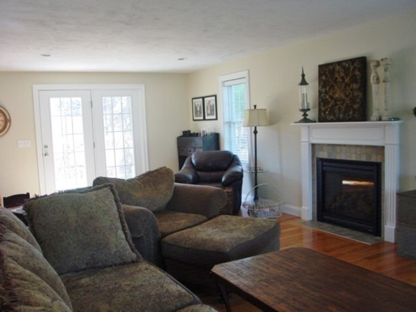 14 Carlson's Way Rutland, MA 01543 - Photo 9 of 20 a living room with furniture and a fireplace