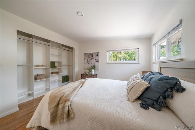 a view of a livingroom with furniture and staircase