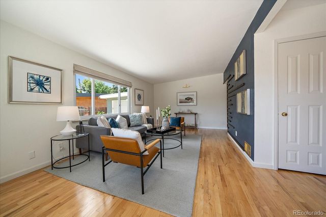 a kitchen with stainless steel appliances granite countertop a refrigerator and microwave