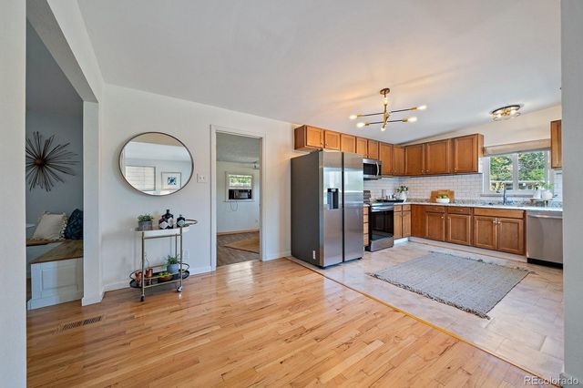 a spacious bedroom with a bed and a table