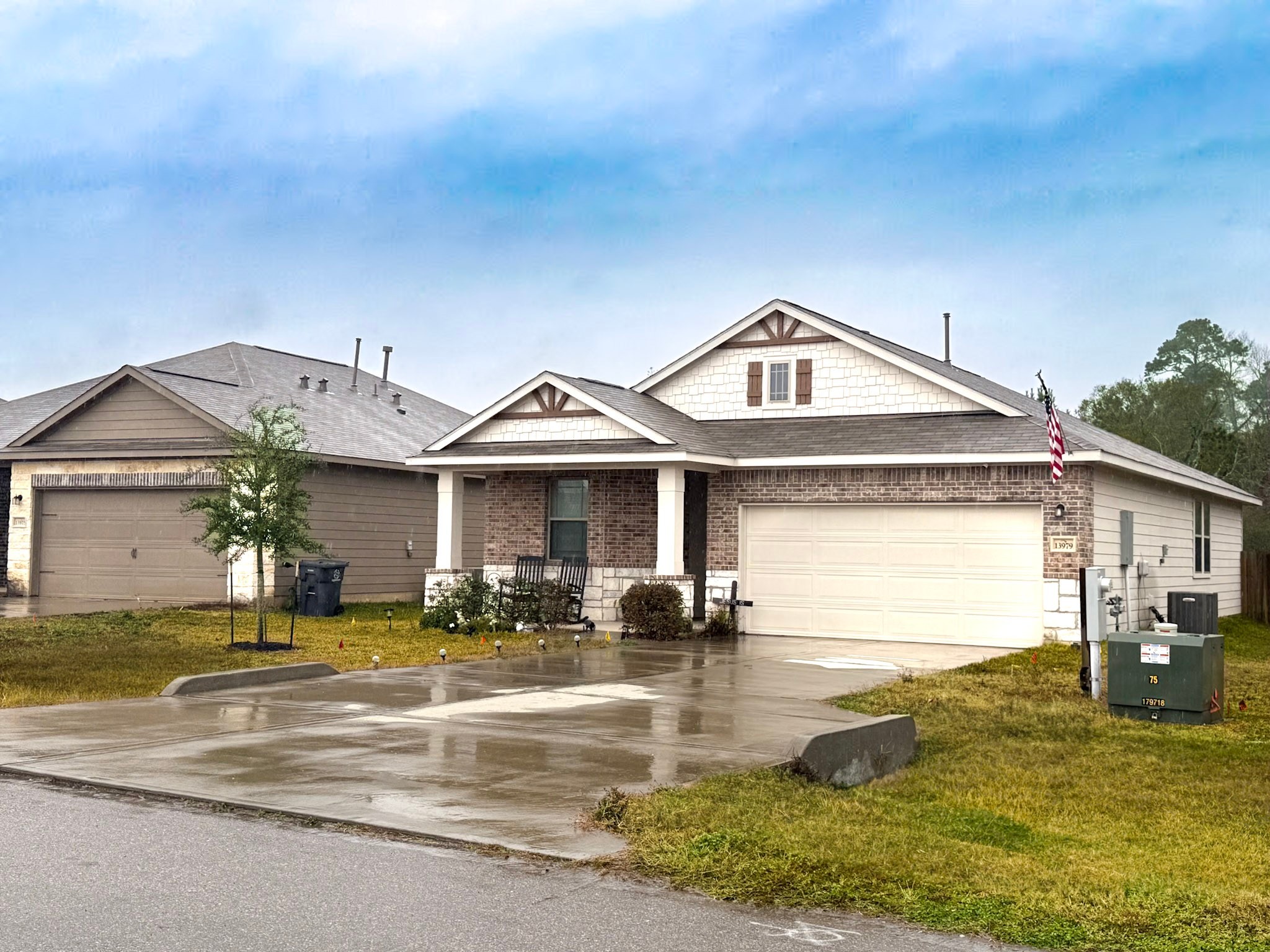 13979 Katlin Road Conroe, TX 77306 - Photo 4 of 13 a front view of a house with swimming pool