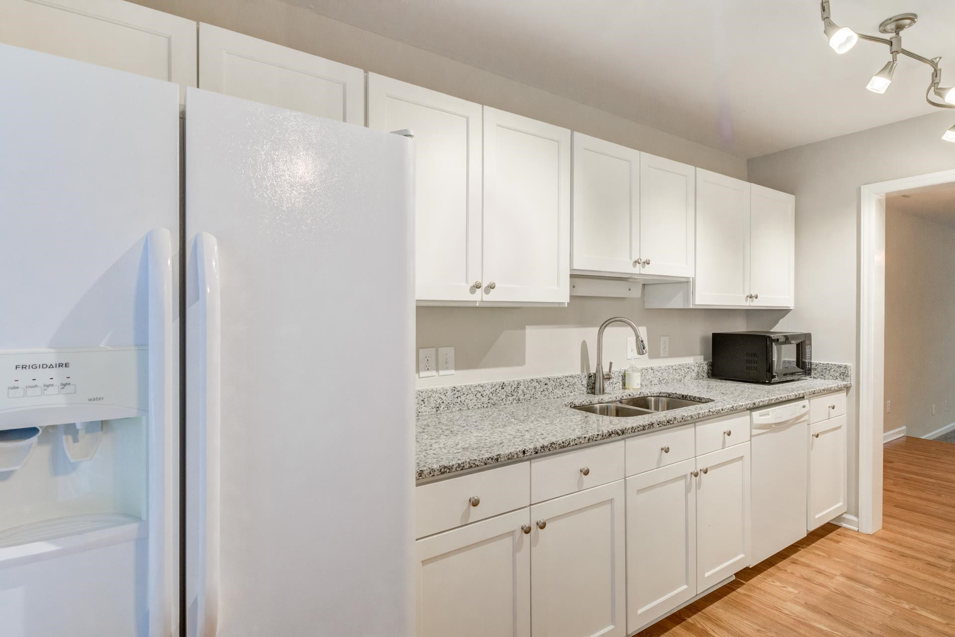 New granite in this gorgeous galley style kitchen. Kitchen