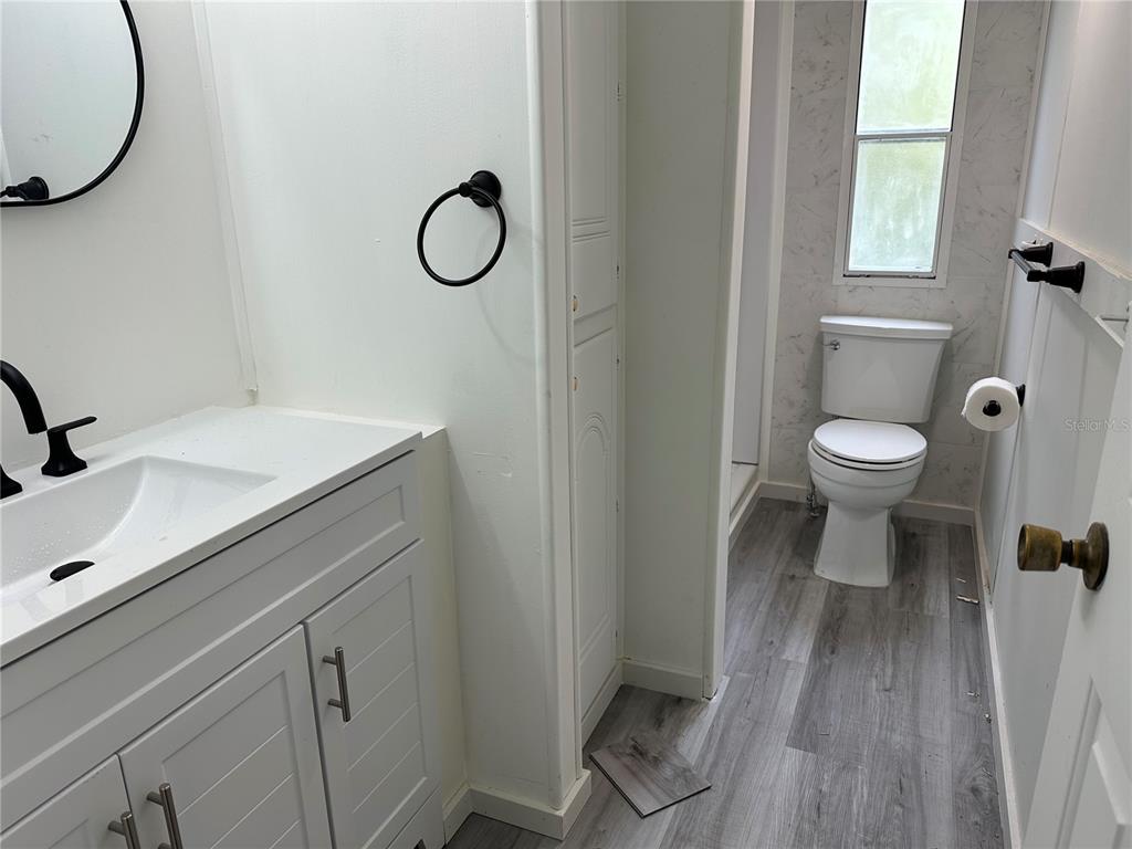 237 North Candle Point Crystal River, FL 34429 - Photo 14 of 21 a bathroom with a toilet sink and mirror