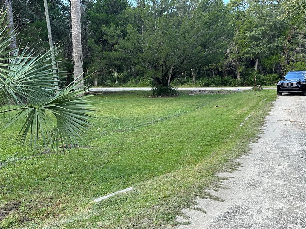 237 North Candle Point Crystal River, FL 34429 - Photo 5 of 21 a view of outdoor space with deck and yard