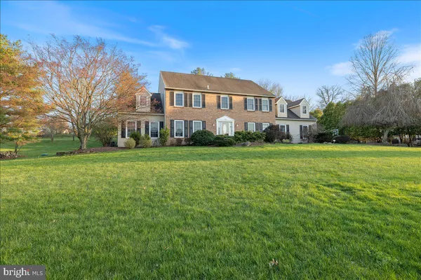 a view of a house with a big yard