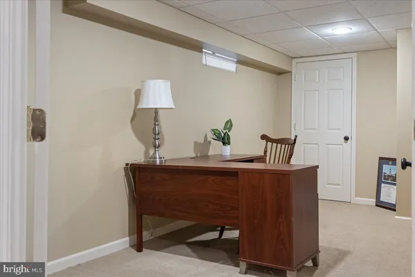 a dining room with furniture and a table