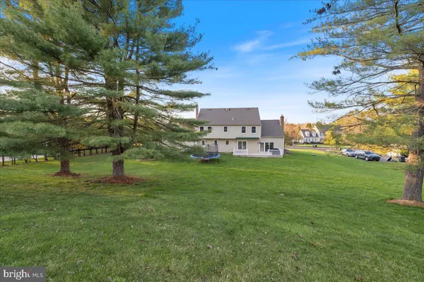 a view of a house with a big yard