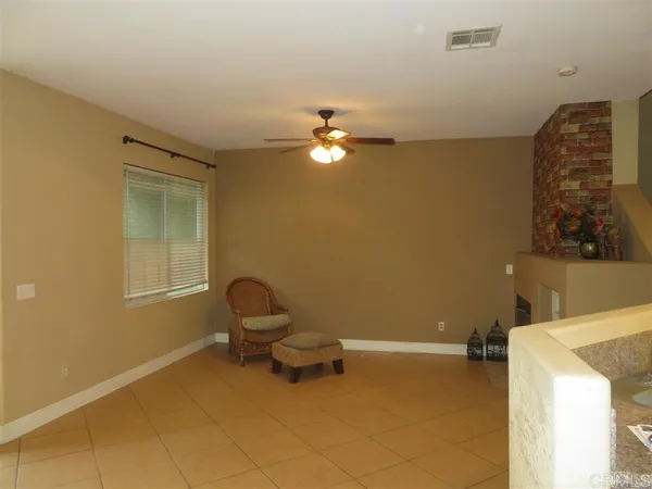 a room with furniture and air conditioner