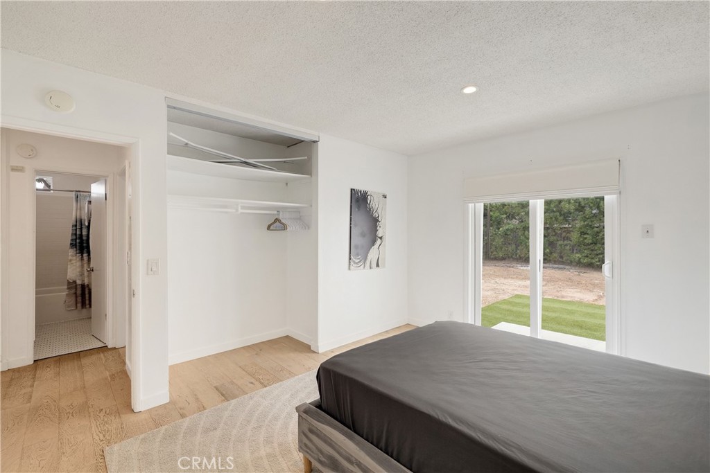 207 South Aviation Boulevard Manhattan Beach, CA 90266 - Photo 23 of 29 a view of an empty room with wooden floor and a window
