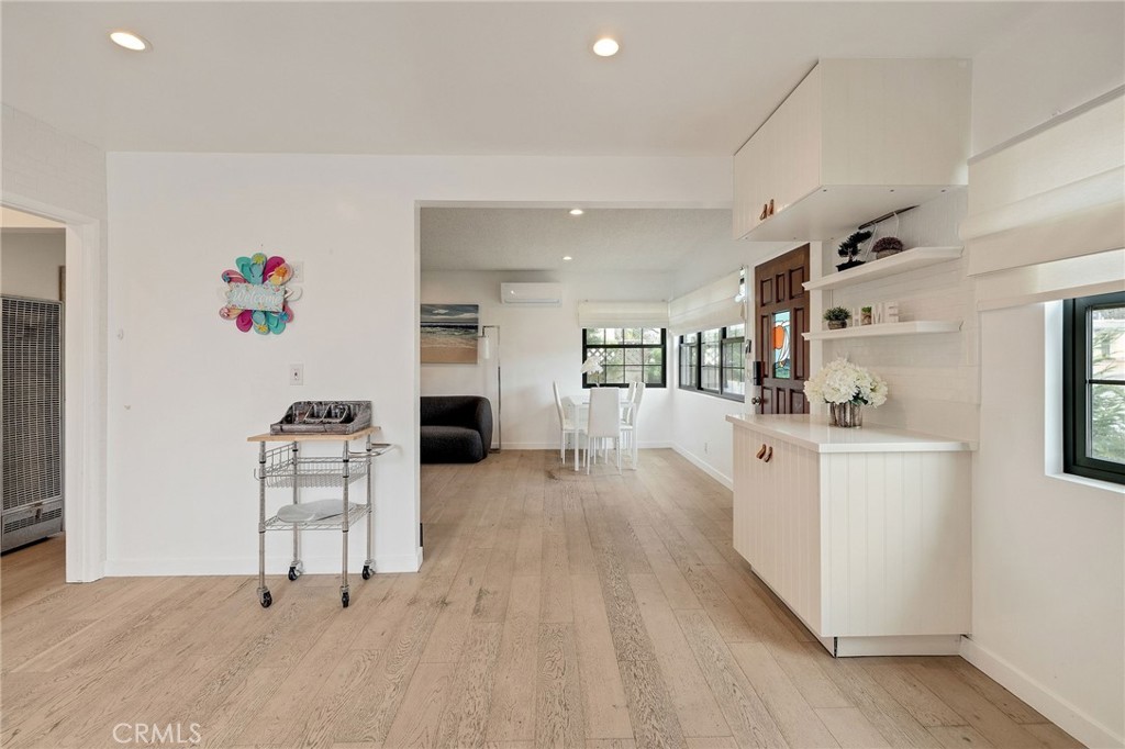 207 South Aviation Boulevard Manhattan Beach, CA 90266 - Photo 10 of 29 a view of kitchen with furniture and wooden floor