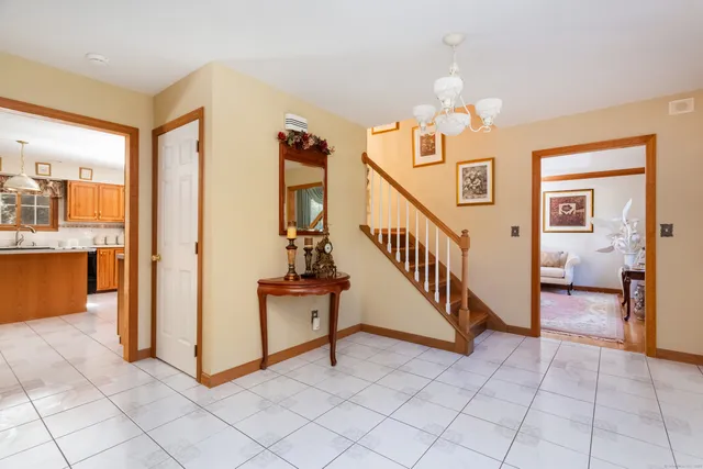 a view of a hallway with staircase