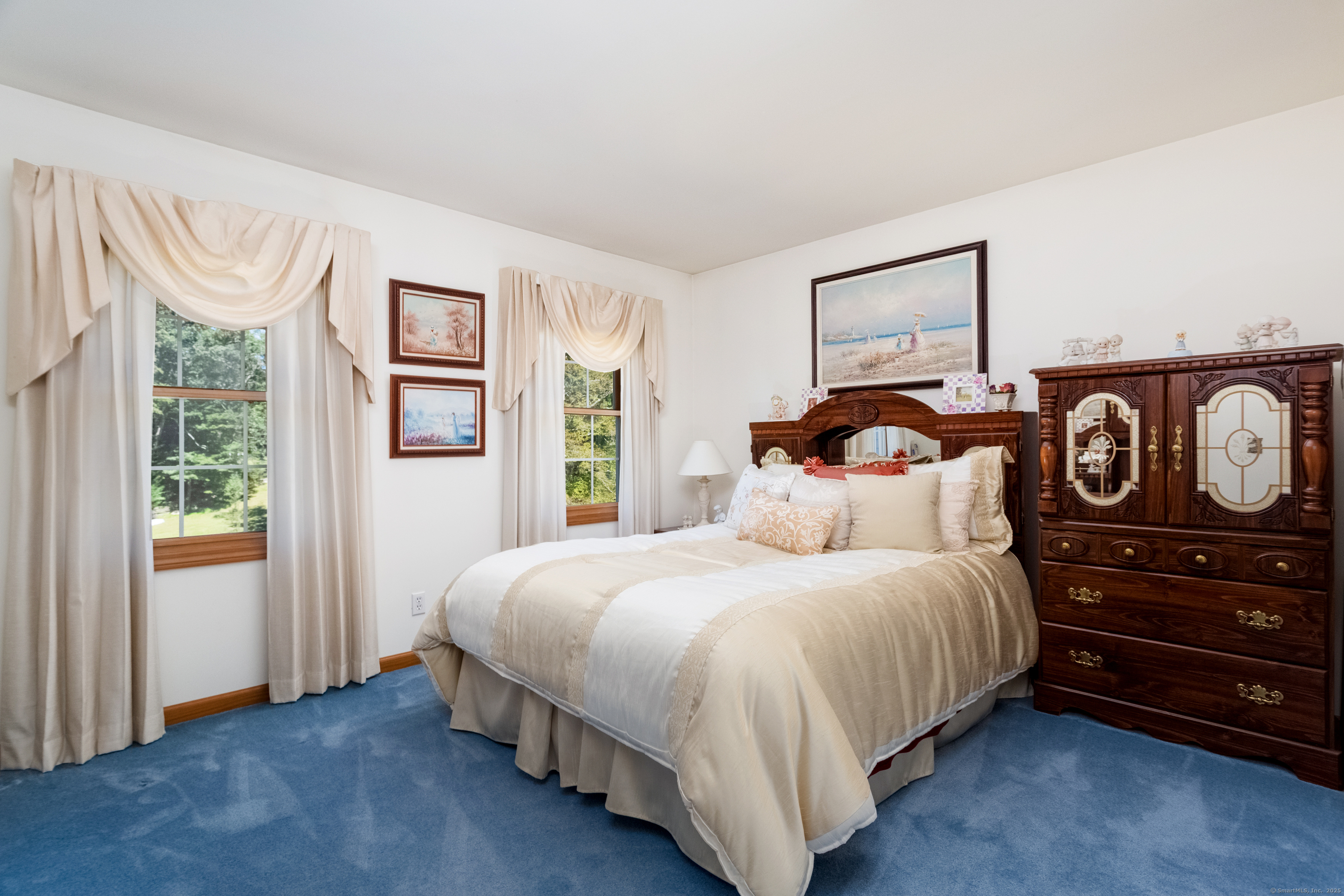 491 Hammertown Road Monroe, CT 06468 - Photo 30 of 40 a bedroom with a bed and a closet with window