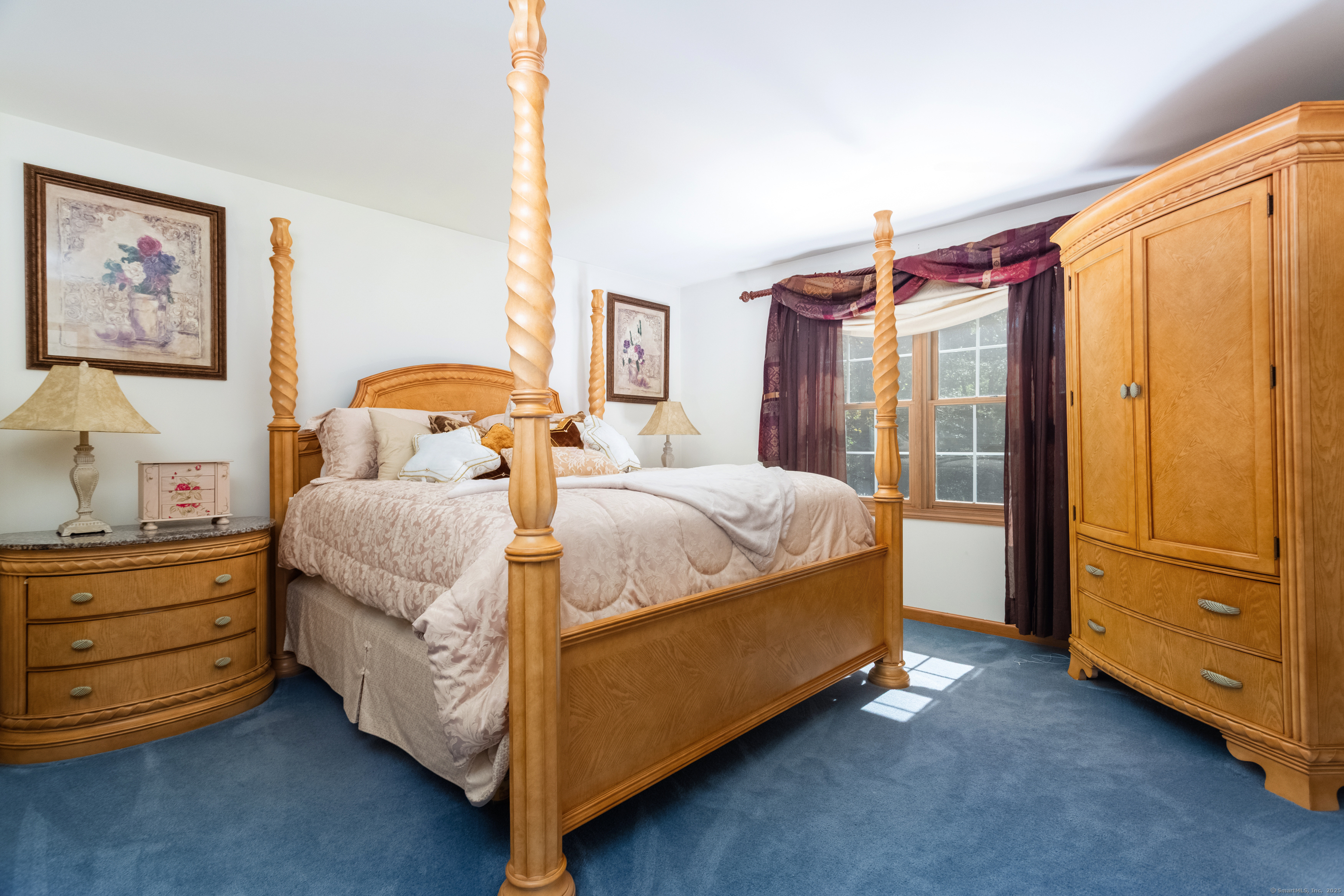 491 Hammertown Road Monroe, CT 06468 - Photo 31 of 40 a bedroom with a bed and a dresser