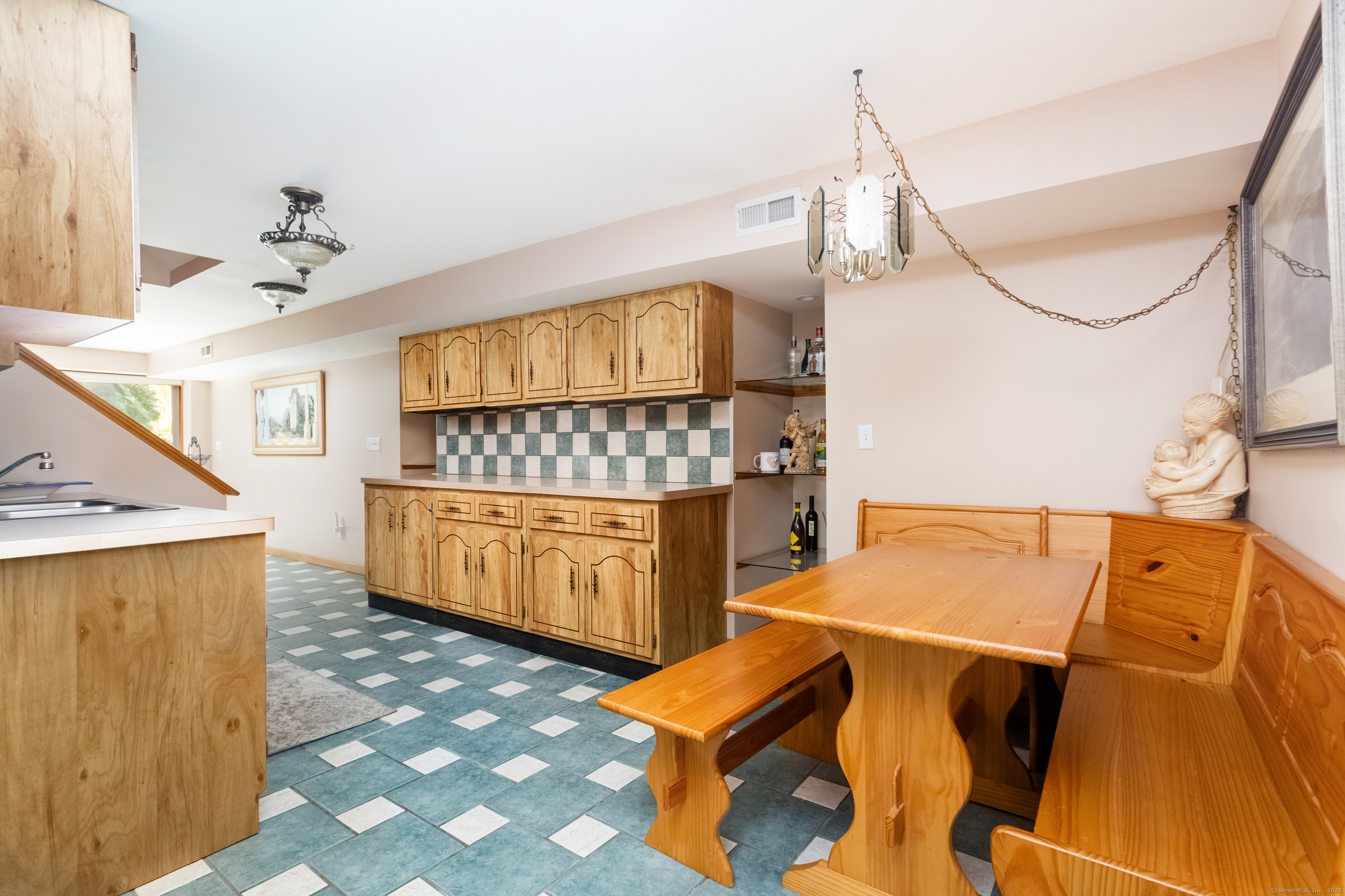 491 Hammertown Road Monroe, CT 06468 - Photo 35 of 40 a kitchen that has a sink and a stove