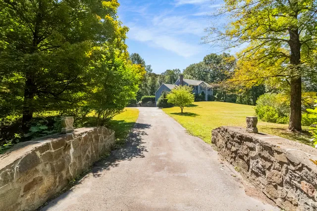 a view of a yard with swimming pool