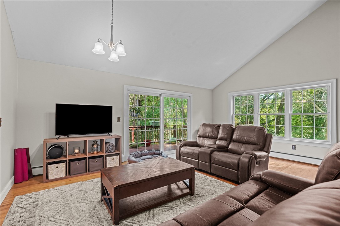 43 Hillside Road Cumberland, RI 02864 - Photo 5 of 24 Living room with sliding glass door to deck