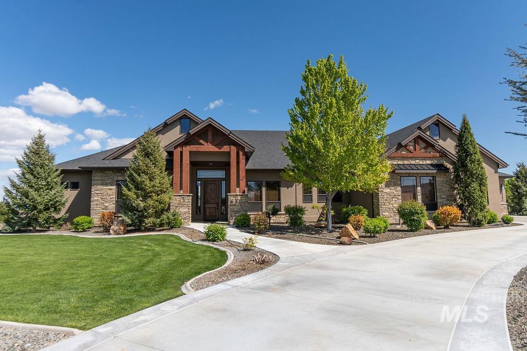 15350 Syrah Court Caldwell, ID 83607 - Photo 3 of 50 Contemporary-style residence featuring a stone and stucco exterior