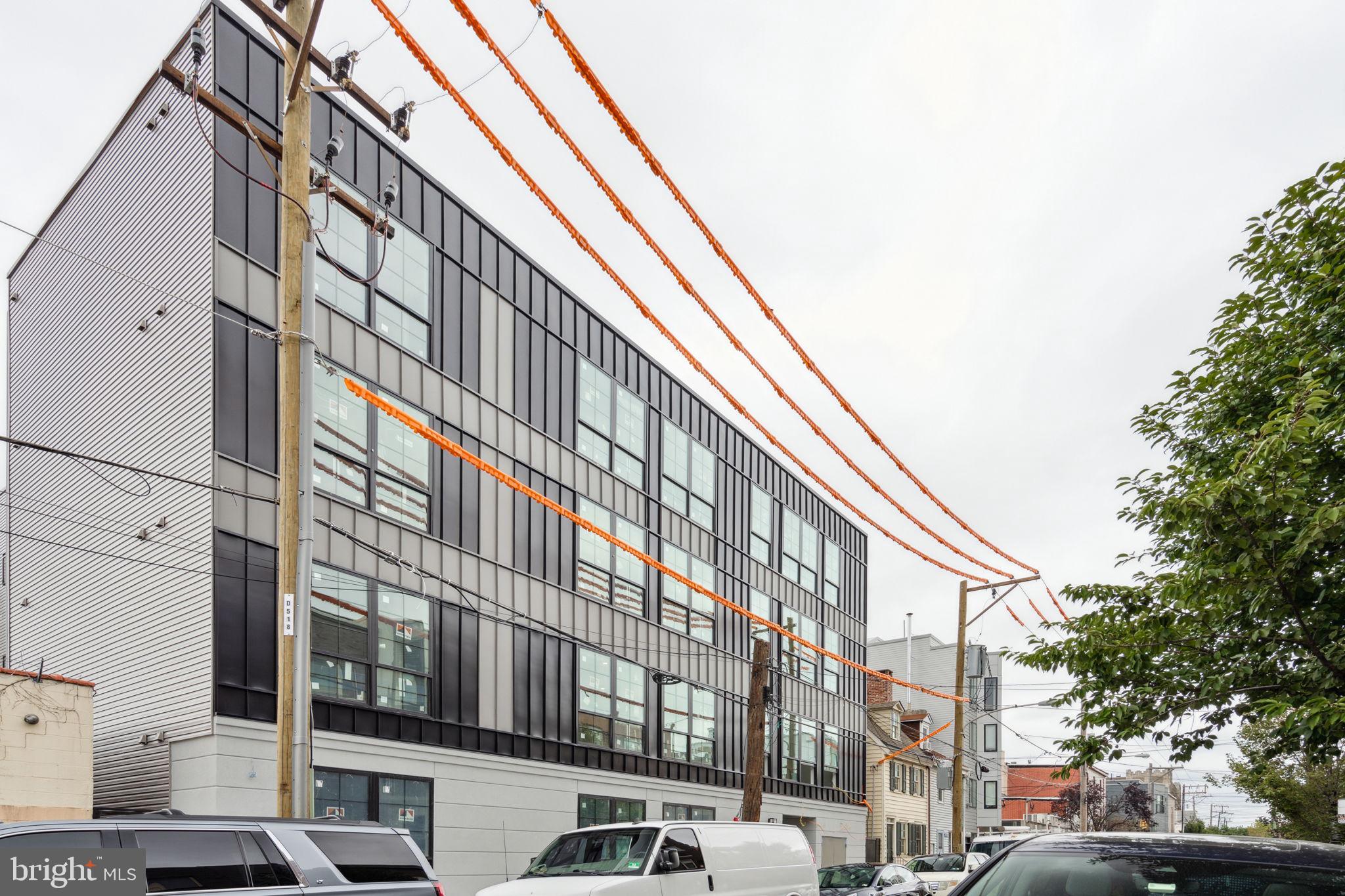 1112-16 East Berks Street, Unit 408 Philadelphia, PA 19125 - Photo 2 of 9 a front view of a building