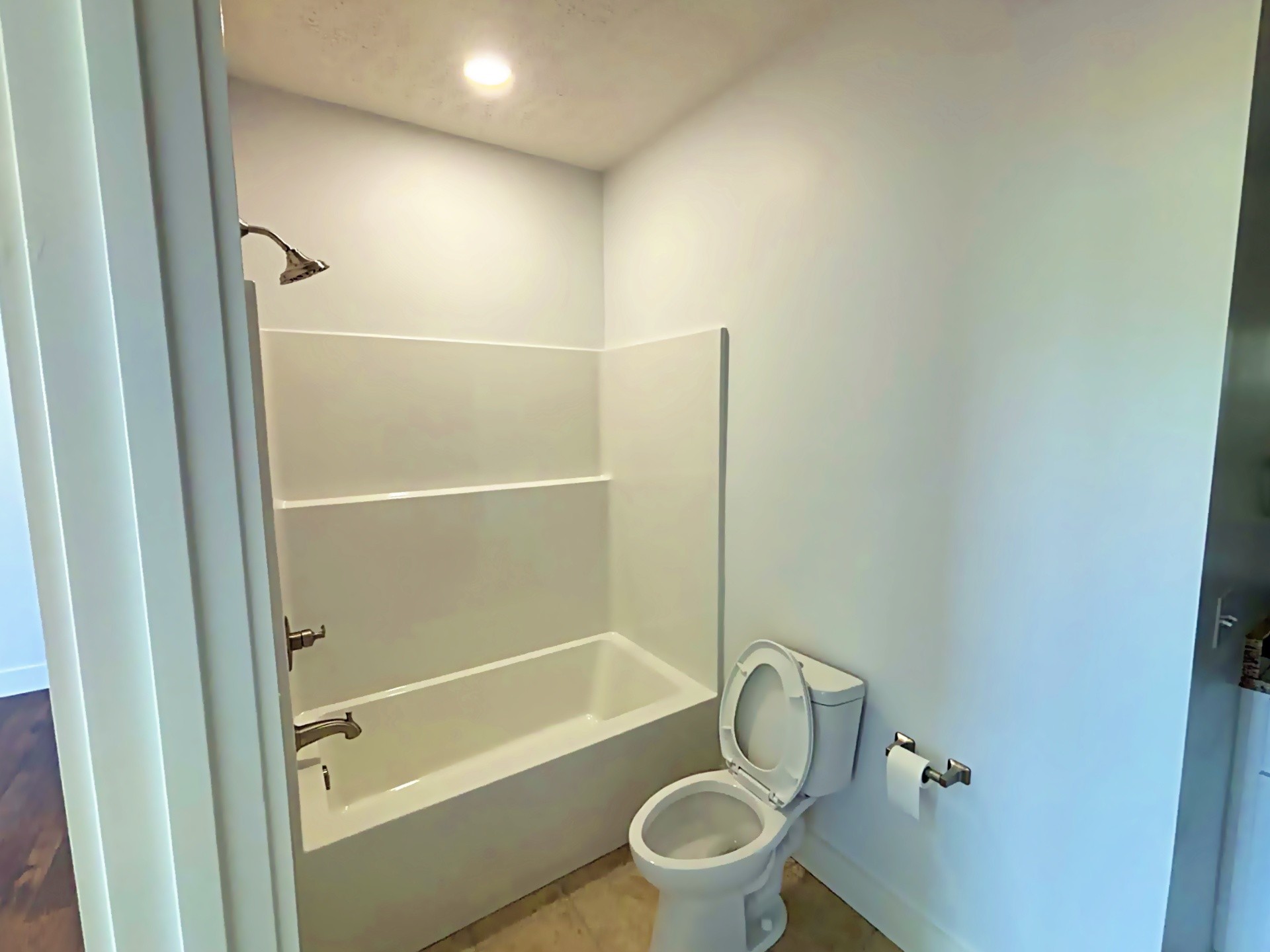 821 Alman Cemetery Road Paris, TN 38242 - Photo 18 of 32 a bathroom with a toilet and a shower