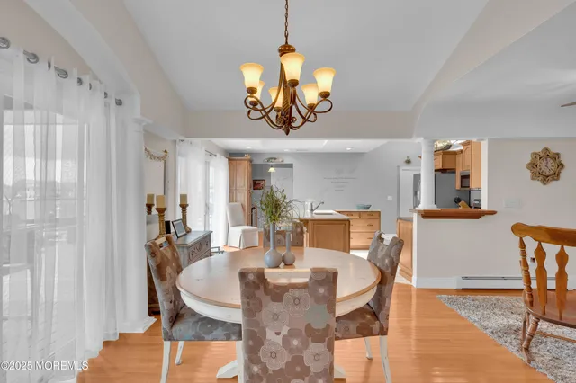 a bathroom with a sink a mirror and a shower