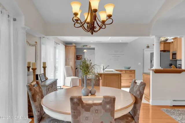 a bedroom with a bed and a table in it