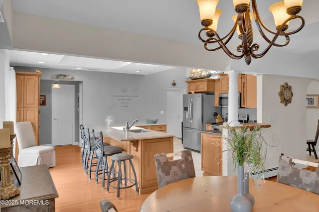 a bedroom with two beds and a couch