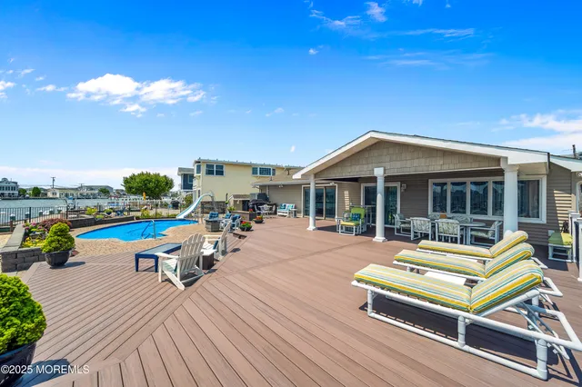 a view of a terrace with seating area