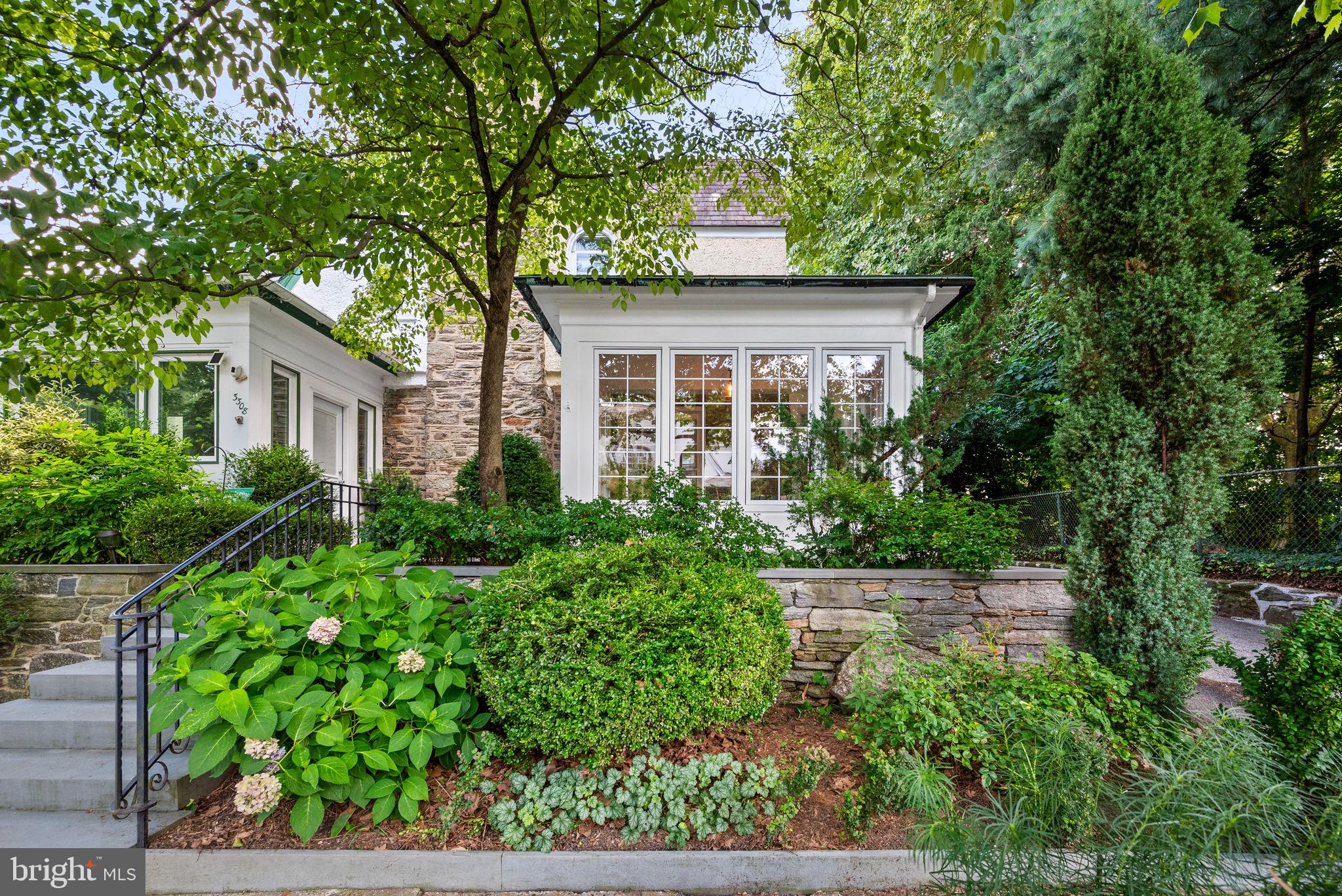 3310 West Penn Street Philadelphia, PA 19129 - Photo 1 of 26 front view of a house with a small yard
