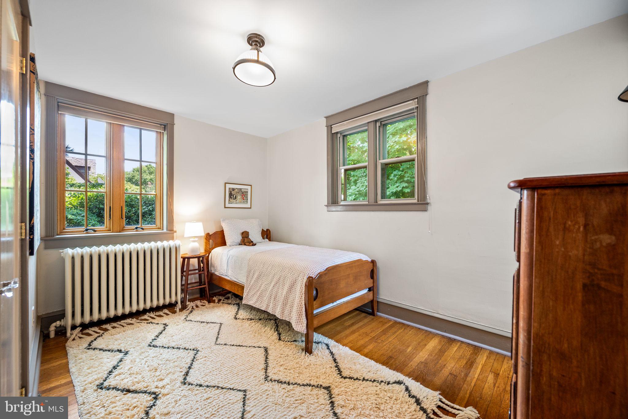 3310 West Penn Street Philadelphia, PA 19129 - Photo 17 of 26 a bedroom with a bed and a window